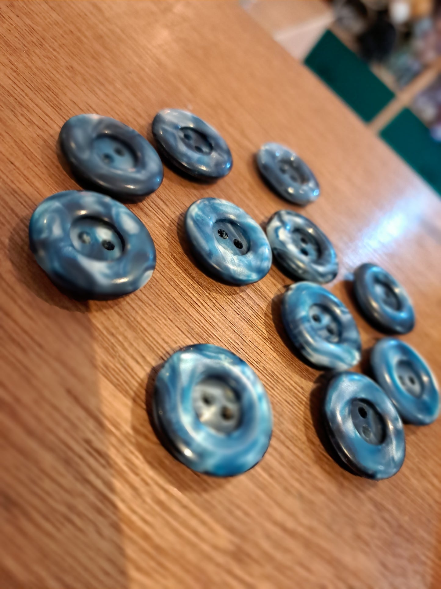 The buttons on a wooden surface.