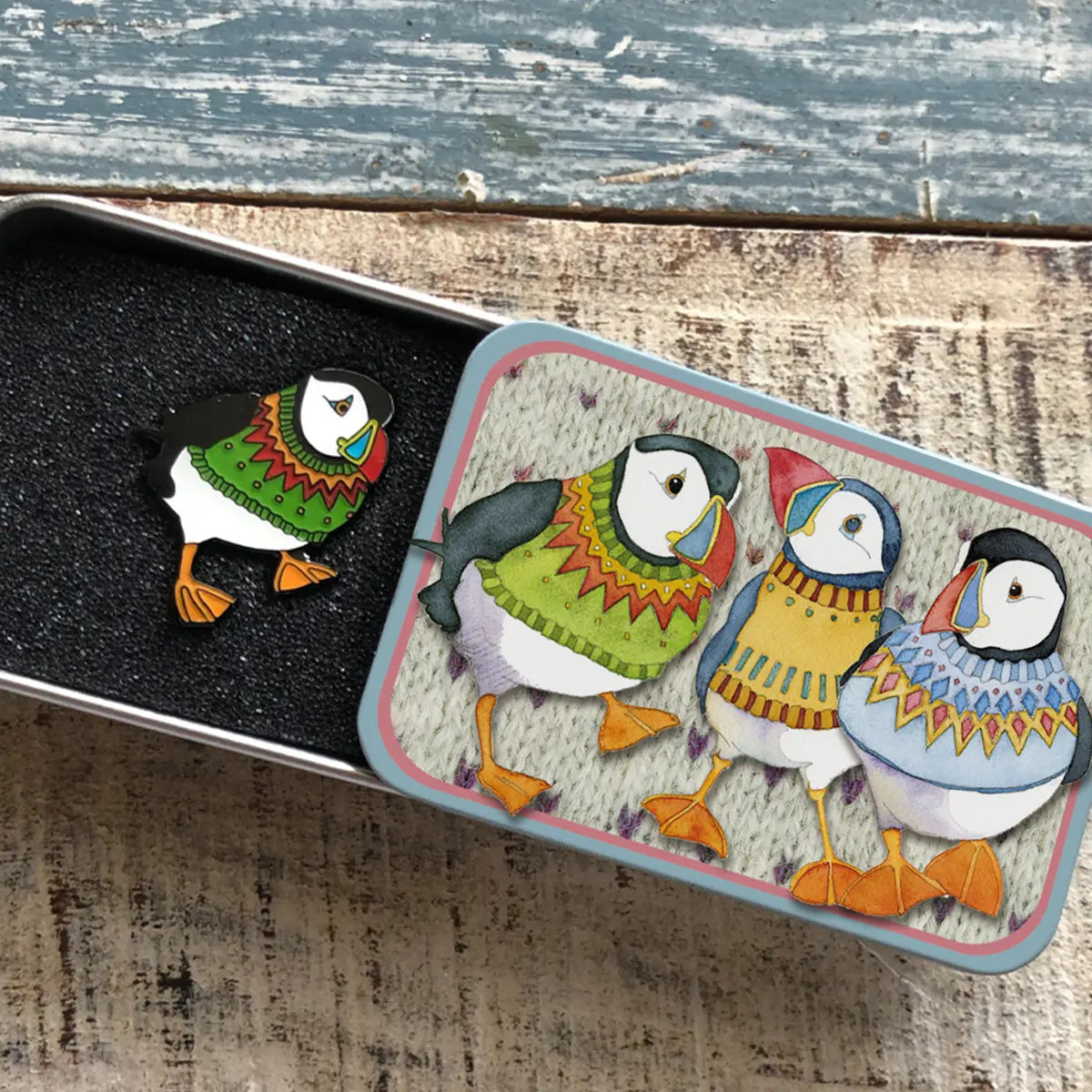Puffin in a green jumper